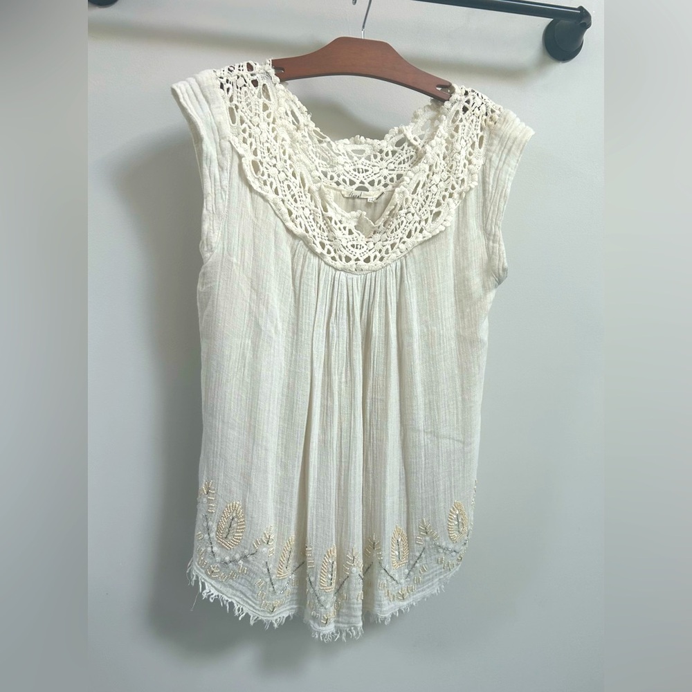 Beautifully detailed cap sleeve blouse